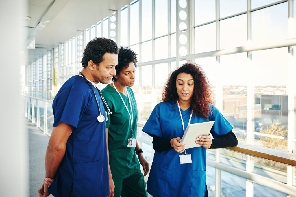 Group of nurses reviewing patient results together